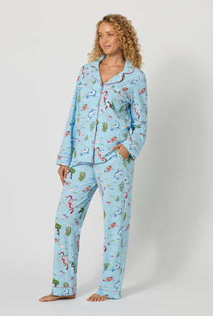 A lady wearing Jingle All The Wave Long Sleeve Classic Stretch Jersey Pj Set looking side