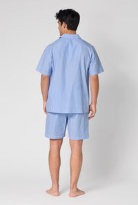 A Man Wearing French Stripe Men's Short Sleeve Woven Supersoft Cotton Poplin Short Pj Set in a back view pose