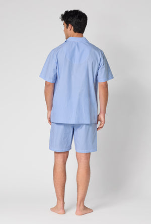 A Man Wearing French Stripe Men's Short Sleeve Woven Supersoft Cotton Poplin Short Pj Set in a back view pose
