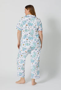 A lady wearing plus size Treasure Hunt Short Sleeve Classic Stretch Jersey Cropped Pj Set back view