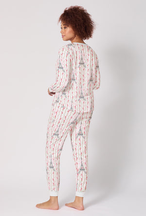 A Lady Wearing Fleur De La Tour Long Sleeve Pullover Crew And Jogger Stretch Jersey Pj Set in a back view pose