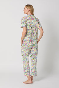 A Lady Wearing Multi Color Short Sleeve Classic Stretch Jersey Cropped PJ Set with Cottage Garden Print Back View