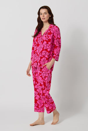A lady wearing Isabella Flora 3/4 Sleeve Classic Stretch Jersey Cropped Pj Set walking