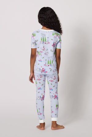 A Girl Wearing Belle Vie Short Sleeve Stretch Jersey Kids Pj Set in a back view pose