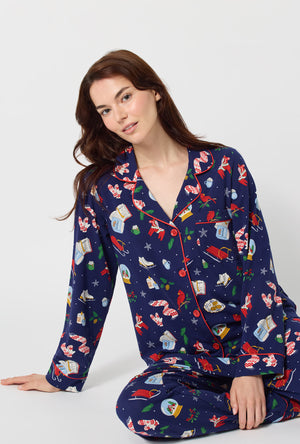 A lady wearing Nordic Nights Long Sleeve Classic Stretch Jersey Pj Set sitting down