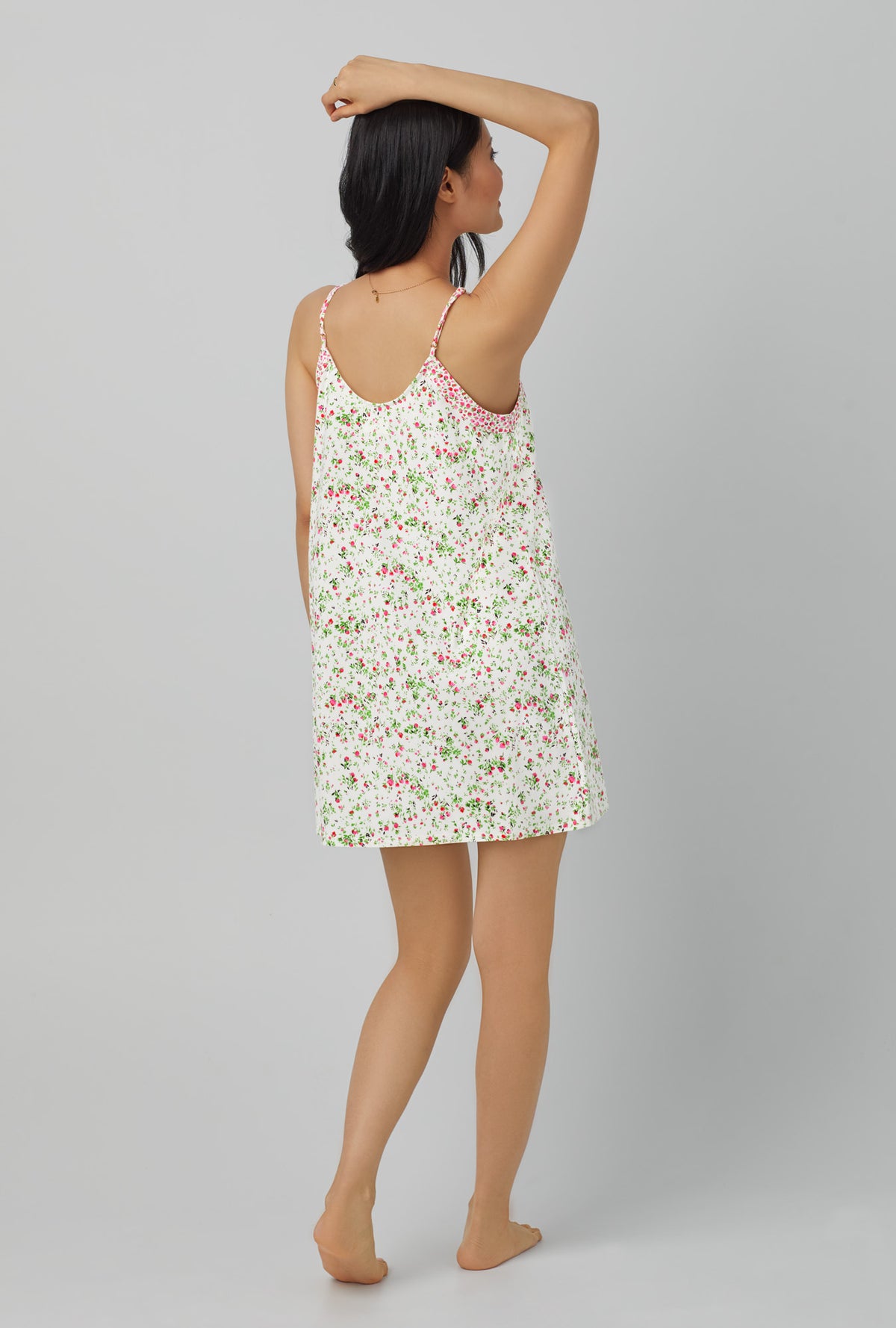 A lady wearing white Stretch Jersey Chemise with Nellie print