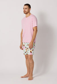 A man wearing Green and Pink Men's Short Sleeve Henley Stretch Jersey Short Pj Set side view