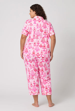 A Lady Wearing Plus Size Cake Shop Short Sleeve Classic Stretch Jersey Cropped Pj Set in a back view pose