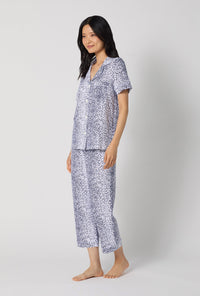 A lady wearing Sea Kitten Short Sleeve Classic Stretch Jersey Cropped Pj Set looking side
