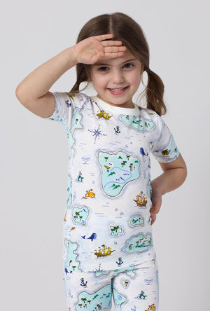 A little girl wearing Treasure Hunt Short Sleeve Stretch Jersey Kids Short Pj Set closer look