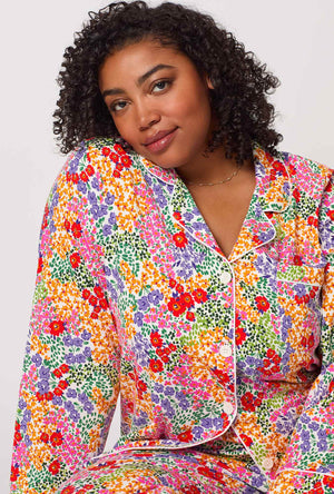 A lady wearing plus size Spring Fields Long Sleeve Classic Stretch Jersey Pj Set