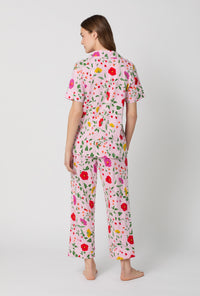 A lady wearing Sunlit Floral Short Sleeve Classic Stretch Jersey Cropped Pj Set