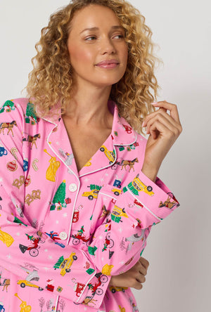 A lady wearing Holiday On Fifth Long Sleeve Classic Stretch Jersey Pj Set closer look
