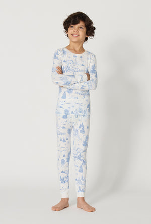 A boy wearing Winter Wonderland Long Sleeve Stretch Jersey Kids Pj Set