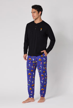 A Man Wearing Spooky Season Snoopy Men's Long Sleeve Henley And Jogger Stretch Jersey Pj Set in a side angled pose