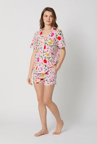 A lady wearing Sunlit Floral Short Sleeve Classic Shorty Stretch Jersey Pj Set
