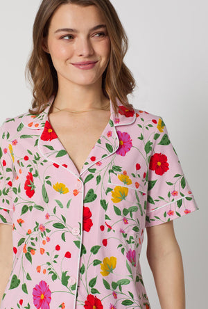 A lady wearing Sunlit Floral Short Sleeve Classic Shorty Stretch Jersey Pj Set