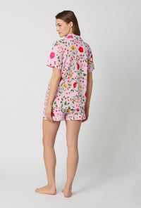 A lady wearing Sunlit Floral Short Sleeve Classic Shorty Stretch Jersey Pj Set