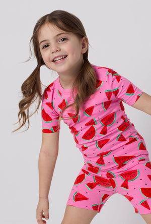 A little girl wearing Watermelon Crush Short Sleeve Stretch Jersey Kids Short Pj Set closer look