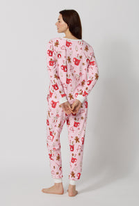 A lady wearing Candy And Cocoa Long Sleeve Pullover Crew And Jogger Stretch Jersey Pj Set back view