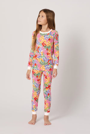 A girl wearing Spring Fields Long Sleeve Stretch Jersey Kids Pj Set