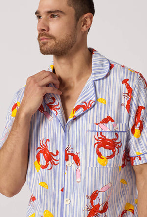 A man wearing Coastal Feast Men's Short Sleeve Classic Stretch Jersey Short Pj Set closer look