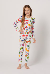 A girl wearing Made In The Shade Long Sleeve Stretch Jersey Kids Pj Set