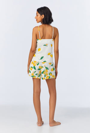 A lady wearing White and Yellow Cami Stretch Jersey Shorty PJ Set side view