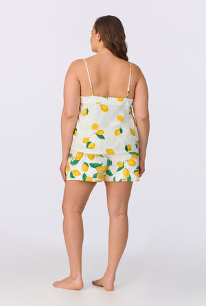 A lady wearing White and Yellow Cami Stretch Jersey Shorty plus size PJ Set back view