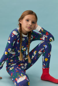 A girl wearing Alice's Adventures Long Sleeve Stretch Jersey Kids Pj Set