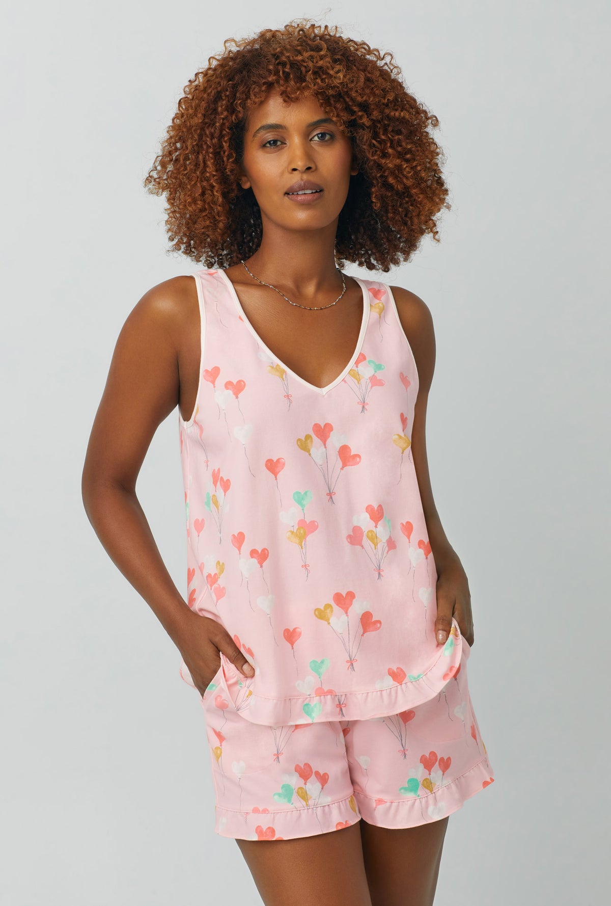 A lady wearing Tank Shorty Stretch Jersey PJ Set with Floating Hearts Ruffle print