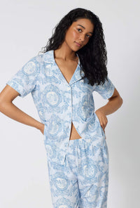 A Lady Wearing Minuet Toile Short Sleeve Classic Stretch Jersey Cropped Pj Set facing front in a closeup shot