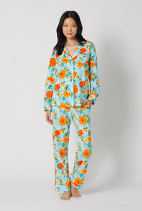 A lady wearing Golden Breeze Long Sleeve Classic Stretch Jersey Pj Set