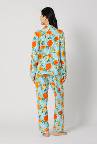 A lady wearing Golden Breeze Long Sleeve Classic Stretch Jersey Pj Set back view