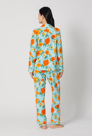 A lady wearing Golden Breeze Long Sleeve Classic Stretch Jersey Pj Set back view