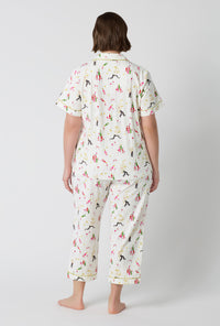 A Lady Wearing Plus Size Bar A Vin Short Sleeve Classic Stretch Jersey Cropped Pj Set in a back facing pose