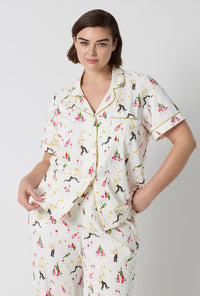 A Lady Wearing Plus Size Bar A Vin Short Sleeve Classic Stretch Jersey Cropped Pj Set in a front facing close up pose