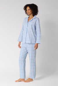 A lady wearing Meadow Haze Plaid Long Sleeve Classic Woven Portuguese Flannel Pj Set looking side