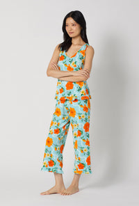 A lady wearing Golden Breeze Ruffle Tank Stretch Jersey Cropped Pj Set looking side