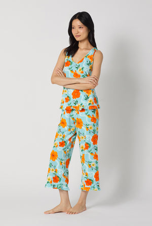 A lady wearing Golden Breeze Ruffle Tank Stretch Jersey Cropped Pj Set looking side