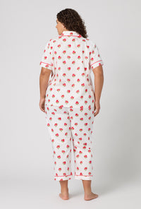 A Lady Wearing Plus Size Celeste Short Sleeve Classic Woven Supersoft Cotton Poplin Cropped Pj Set in a back view pose