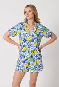 A closeup of A lady wearing Blue and White Short Sleeve Classic Shorty Stretch Jersey Pj Set