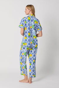 A lady wearing Blue and White Short Sleeve Classic Stretch Jersey Cropped Pj Set back view