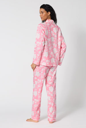 A Lady Wearing Dynasty Pink Long Sleeve Classic Woven Cotton Poplin Pj Set in a back view pose