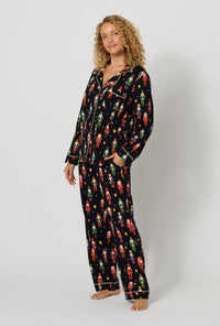 A lady wearing Twinkle & Drum Long Sleeve Classic Stretch Jersey Pj Set