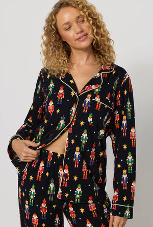 A lady wearing Twinkle & Drum Long Sleeve Classic Stretch Jersey Pj Set closer look