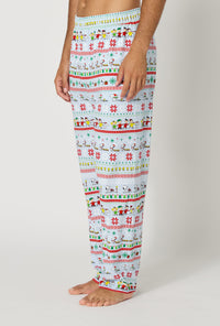 A Man wearing Peanuts® Winter Parade Men's Stretch Jersey Pj Pant side view