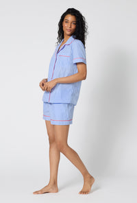 A Lady Wearing French Stripe Short Sleeve Classic Woven Supersoft Cotton Poplin Shorty Pj Set in a side angled pose