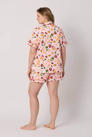 A lady wearing plus size Pink Short Sleeve Classic Shorty Stretch Jersey Pj Set back view