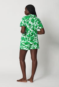 A lady wearing Green and White Short Sleeve Classic Shorty Stretch Jersey Pj Set back view